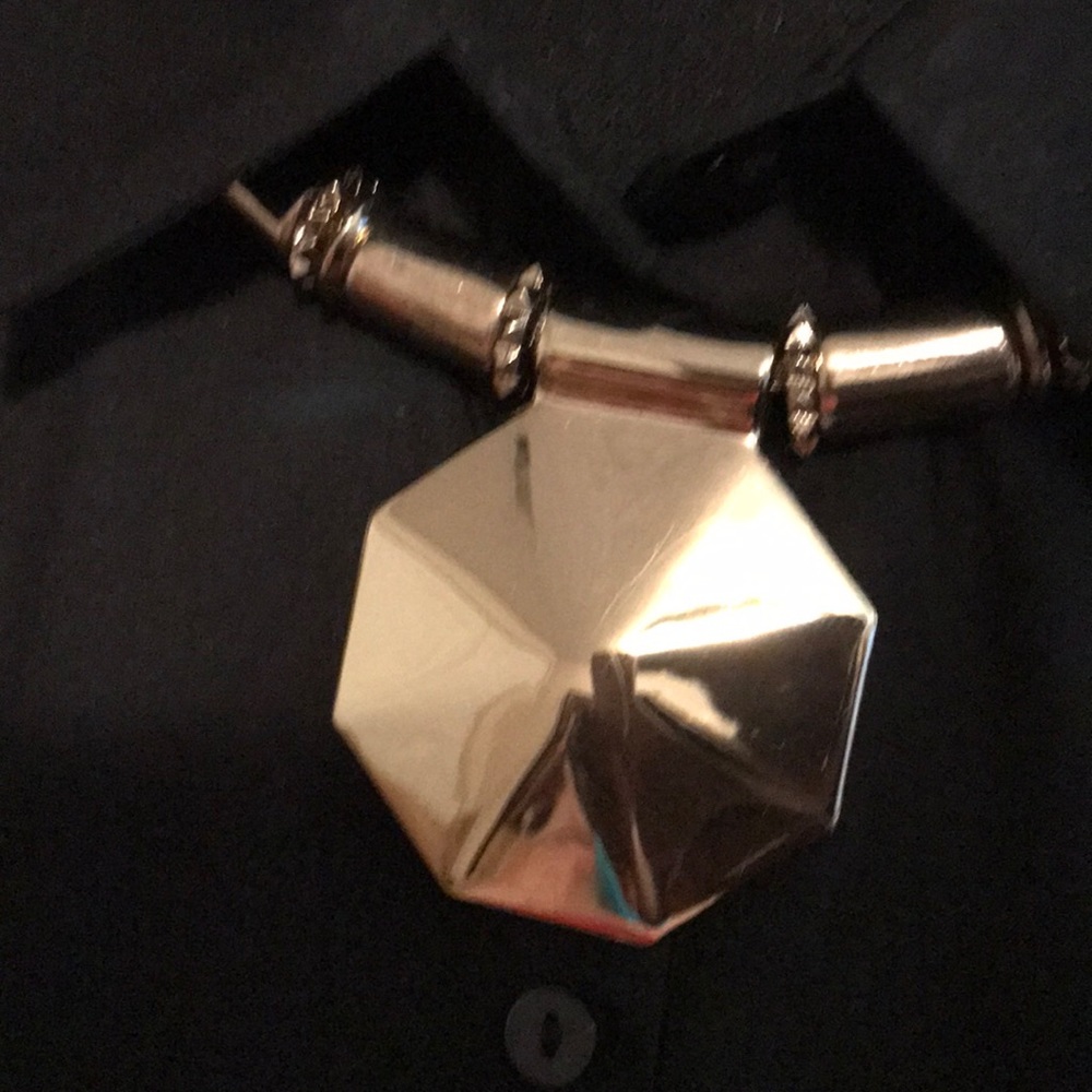 Necklace gold with,16 inch chain.